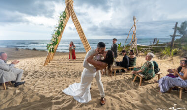 post wedding ceremony couple kissing on the beach